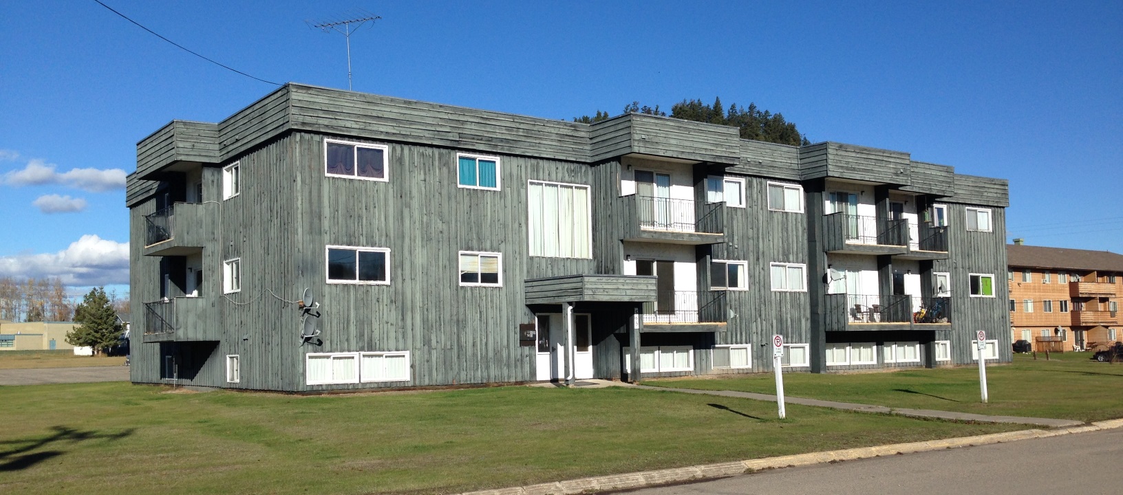 Fraser Lake Apartments Brown Building